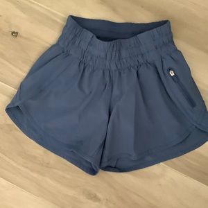 Lululemon,  size 0, 4 inch tracker shorts, blue excellent condition